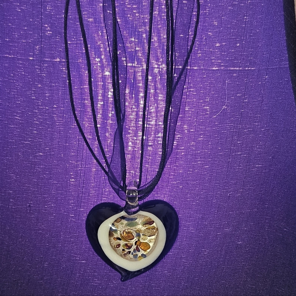 Glass heart with ribbon necklace. Nice keepsake for Valentines Day
